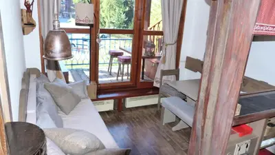 Coin salon dans l'établissement Résidence Archeboc - Appartement 2 pièces 5 personnes à Arc 1800 proche des pistes dans le quartier de Charmettoger MAE-7394