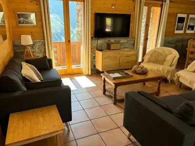 Télévision ou salle de divertissement dans l'établissement Montagnard - 4 bedroom apartment with stunning views