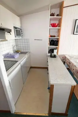Cuisine ou kitchenette dans l'établissement APT 2 PIECES 4/5PERS - MOUTIERES TIGNES