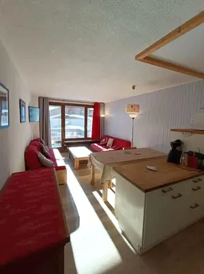 Coin salon dans l'établissement SUPERBE T2 TRAVERSANT- 6PERS - VAL CLARET