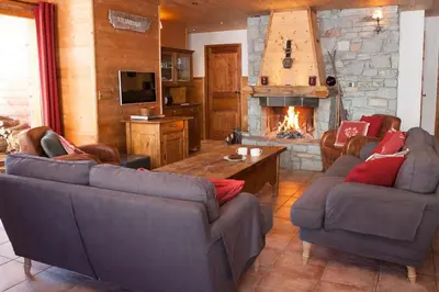 Coin salon dans l'établissement Les 4 saisons - luxury 3-bed apt with sauna
