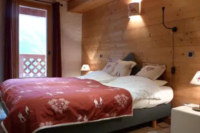 Un ou plusieurs lits dans un hébergement de l'établissement Les 4 saisons - luxury 3-bed apt with sauna