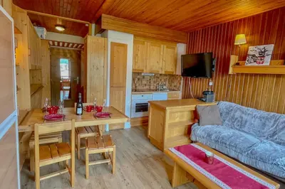 Télévision ou salle de divertissement dans l'établissement Apt with balcony and beautiful view in Val-d'Isère