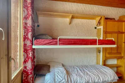 Un ou plusieurs lits dans un hébergement de l'établissement Apt with balcony and beautiful view in Val-d'Isère