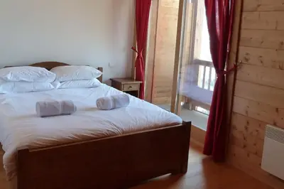 Un ou plusieurs lits dans un hébergement de l'établissement La Croix - 3 bedroom apartment in Sainte Foy village