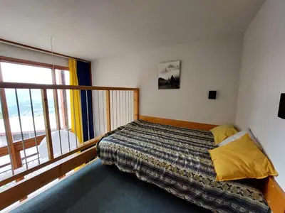 Un ou plusieurs lits dans un hébergement de l'établissement Résidence Aiguille Grive Bat Iii - Appartement 2 pièces 6 personnes en duplex, skis aux pieds, dans le village de Charmettoger à Arc 1800. MAE-6954