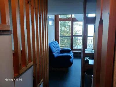 Coin salon dans l'établissement Résidence Aiguille Grive Bat Iii - Appartement 2 pièces 6 personnes en duplex, skis aux pieds, dans le village de Charmettoger à Arc 1800. MAE-6954