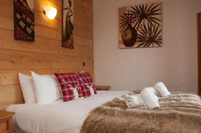 Un ou plusieurs lits dans un hébergement de l'établissement Venus - 2 bedroom apartment next to the slopes