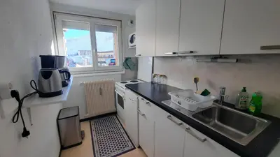 Cuisine ou kitchenette dans l'établissement Spacieux appartement Tignes le Lac
