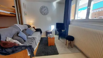 Coin salon dans l'établissement Spacieux appartement Tignes le Lac