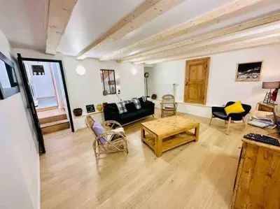 Coin salon dans l'établissement Chalet familial de village en Savoie