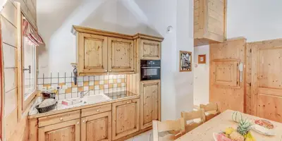 Cuisine ou kitchenette dans l'établissement Résidence Les Alpages - 3 Pièces pour 8 Personnes MAE-4274