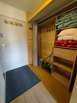 Un ou plusieurs lits dans un hébergement de l'établissement Coup de coeur - Arc 2000 Appartement 4 personnes avec chambre séparée et belle vue sur la montagne