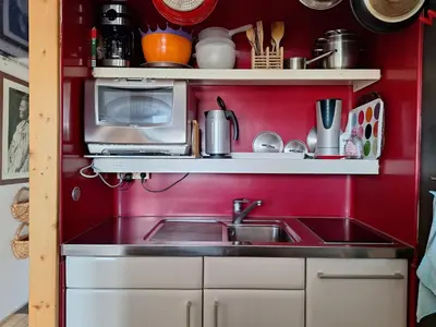 Cuisine ou kitchenette dans l'établissement Appartement cosy 2 pièces pour 5 pers, avec WiFi aux Arcs 1800 - FR-1-411-888
