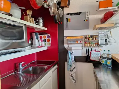Cuisine ou kitchenette dans l'établissement Appartement cosy 2 pièces pour 5 pers, avec WiFi aux Arcs 1800 - FR-1-411-888