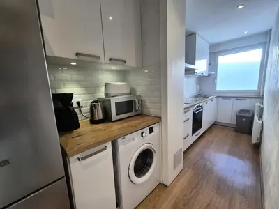 Cuisine ou kitchenette dans l'établissement Résidence Bec Rouge - Appartement entièrement rénové·Pieds pistes·Balcon MAE-4094