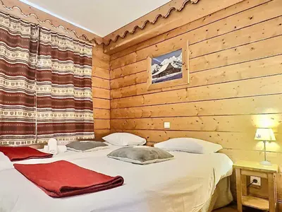 Un ou plusieurs lits dans un hébergement de l'établissement Confortable 4 pièces à Tignes Val Claret pour 8 pers. - FR-1-411-884