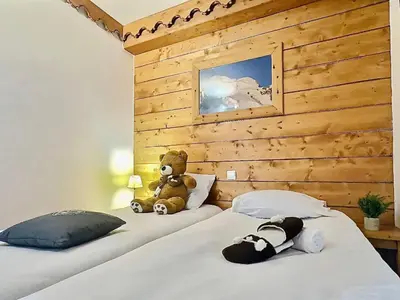 Un ou plusieurs lits dans un hébergement de l'établissement Confortable 4 pièces à Tignes Val Claret pour 8 pers. - FR-1-411-884