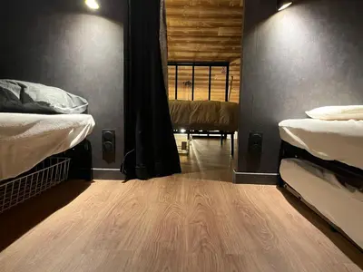 Un ou plusieurs lits dans un hébergement de l'établissement L ADRET - Duplex 6 pers 2 chambres - Belle Plagne PARADISKI