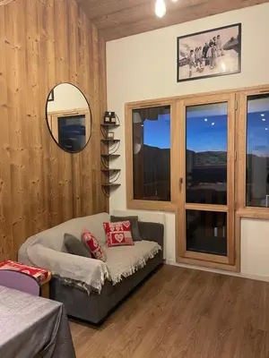 Coin salon dans l'établissement L ADRET - Duplex 6 pers 2 chambres - Belle Plagne PARADISKI