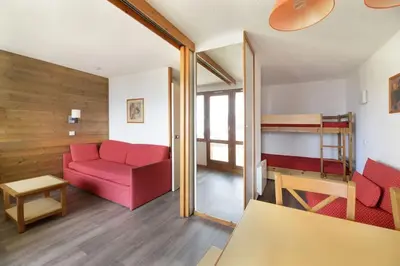 Coin salon dans l'établissement Studio 28m2 vue pistes plein sud du dimanche au dimanche