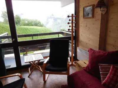 Coin salon dans l'établissement Paradiski calme et ensoleillé plan peisey