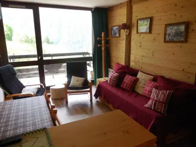 Coin salon dans l'établissement Paradiski calme et ensoleillé plan peisey