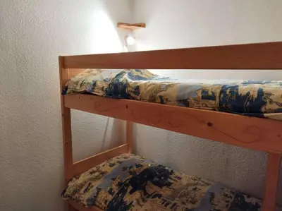 Un ou plusieurs lits dans un hébergement de l'établissement Paradiski proche vanoise express plan peisey