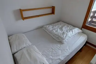 Un ou plusieurs lits dans un hébergement de l'établissement Paradiski ski au pied vallandry