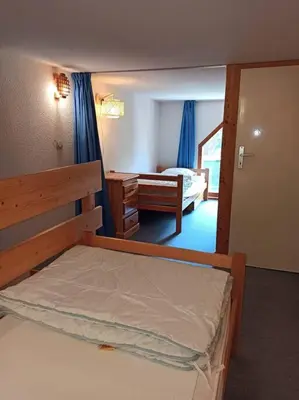 Un ou plusieurs lits dans un hébergement de l'établissement Paradiski ski au pied vallandry