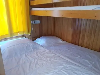 Un ou plusieurs lits dans un hébergement de l'établissement Paradiski bordure de pistes vallandry