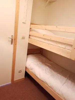 Un ou plusieurs lits dans un hébergement de l'établissement Paradiski ski au pied vallandry