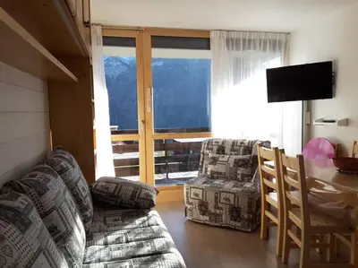 Coin salon dans l'établissement Paradiski proche des pistes plan peisey
