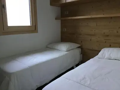 Un ou plusieurs lits dans un hébergement de l'établissement Paradiski proche des pistes plan peisey