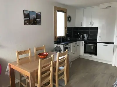 Cuisine ou kitchenette dans l'établissement Paradiski proche des pistes plan peisey