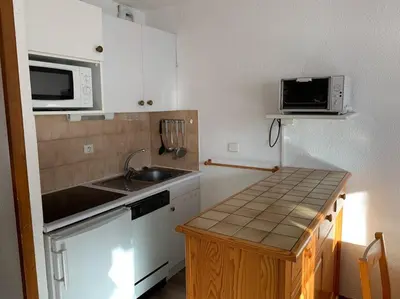 Cuisine ou kitchenette dans l'établissement Paradiski ski au pied vallandry