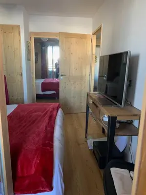 Télévision ou salle de divertissement dans l'établissement Paradiski nouveau, calme et ensoleillé vallandry