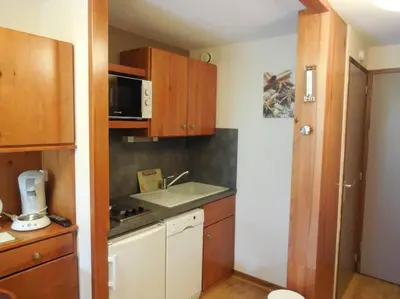 Cuisine ou kitchenette dans l'établissement Paradiski proche pistes et commerces vallandry