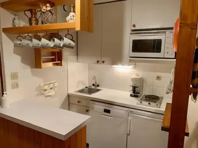 Cuisine ou kitchenette dans l'établissement Paradiski proche pistes et commerces vallandry
