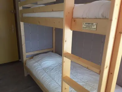 Un ou plusieurs lits superposés dans un hébergement de l'établissement Paradiski calme et ensoleillé plan peisey