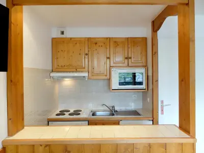Cuisine ou kitchenette dans l'établissement Studio confort 21m² · 4 pers · Balcon · Animaux admis - FR-1-502-504
