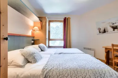 Un ou plusieurs lits dans un hébergement de l'établissement Résidence Les Arcs 1950 Le Village - maeva Home - Appartement 3 Pièces 6 Personnes - Sélection MAE-4534
