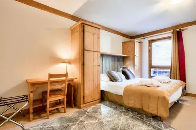 Un ou plusieurs lits dans un hébergement de l'établissement Résidence Les Arcs 1950 Le Village - maeva Home - Appartement 3 Pièces 6 Personnes - Sélection MAE-4534