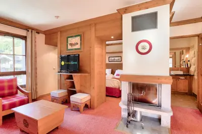 Télévision ou salle de divertissement dans l'établissement Résidence Les Arcs 1950 Le Village - maeva Home - Appartement 2 pièces 4 personnes - Prestige MAE-0134
