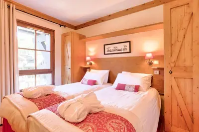 Un ou plusieurs lits dans un hébergement de l'établissement Résidence Les Arcs 1950 Le Village - maeva Home - Appartement 2 pièces 4 personnes - Prestige MAE-0134
