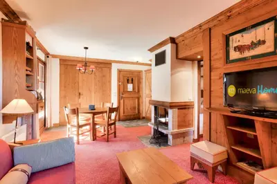Télévision ou salle de divertissement dans l'établissement Résidence Les Arcs 1950 Le Village - maeva Home - Appartement 2 pièces 4 personnes - Prestige MAE-0204
