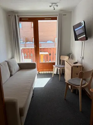 Un ou plusieurs lits dans un hébergement de l'établissement Studio Tignes Val Claret