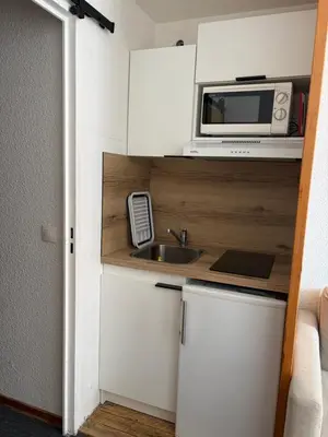 Cuisine ou kitchenette dans l'établissement Studio Tignes Val Claret