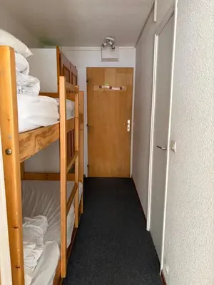 Un ou plusieurs lits dans un hébergement de l'établissement Studio Tignes Val Claret