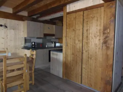 Cuisine ou kitchenette dans l'établissement Chalet l'aubépine résidence B&B